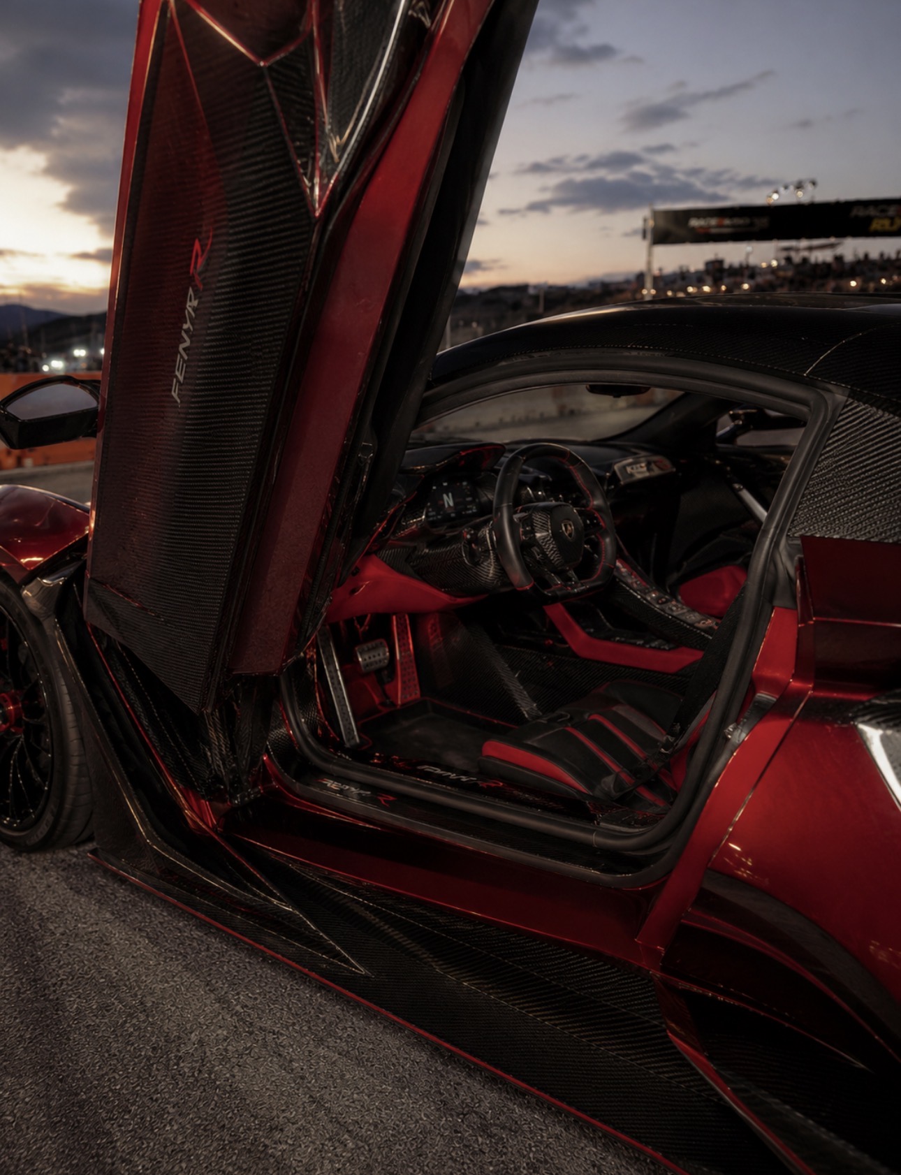 Red supercar door and interior close-up