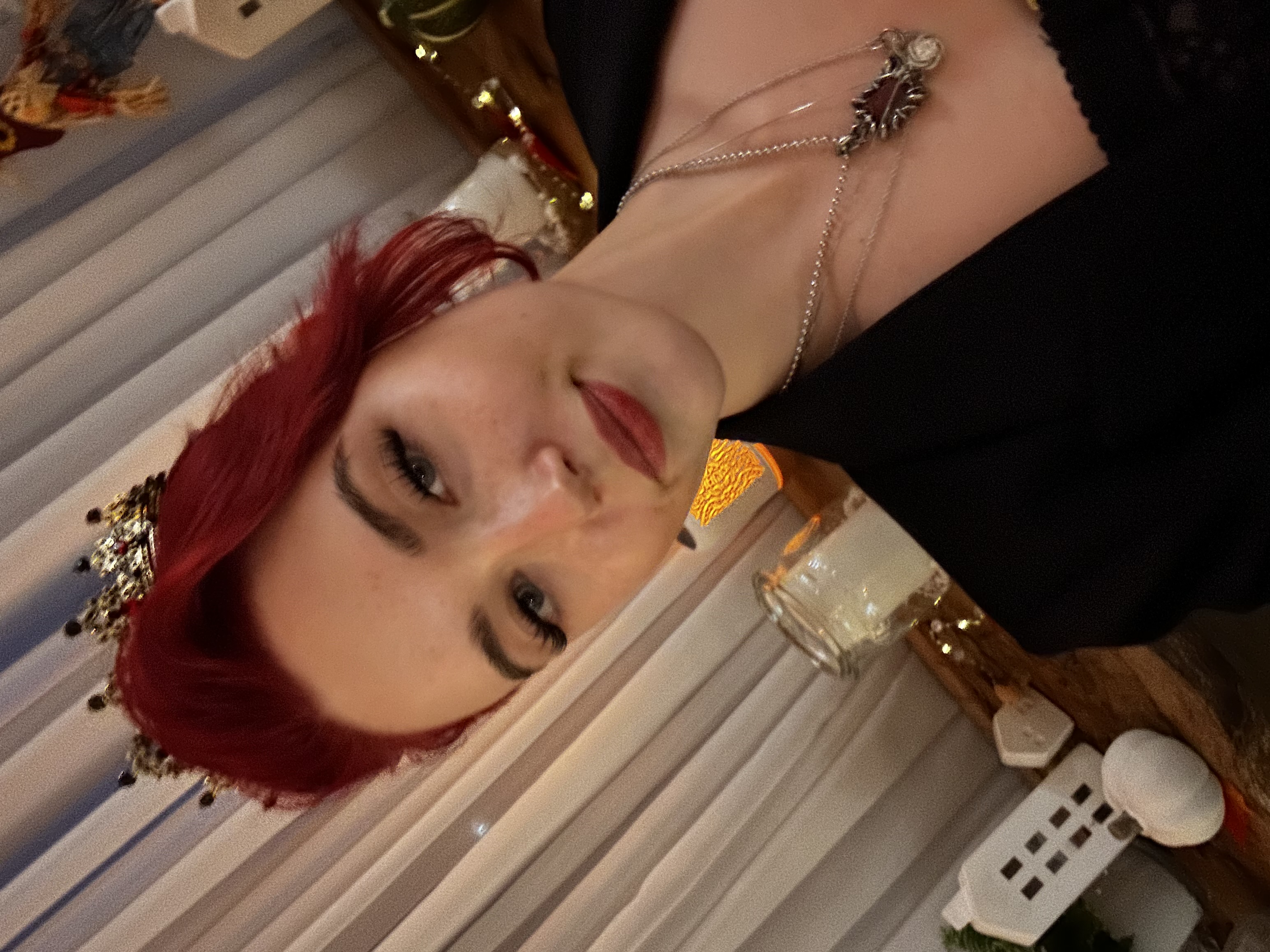Alice Kwong wearing a crown in a candid portrait