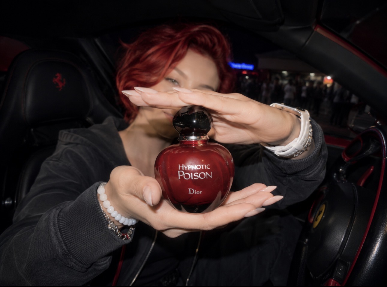 Alice Kwong holding Dior perfume