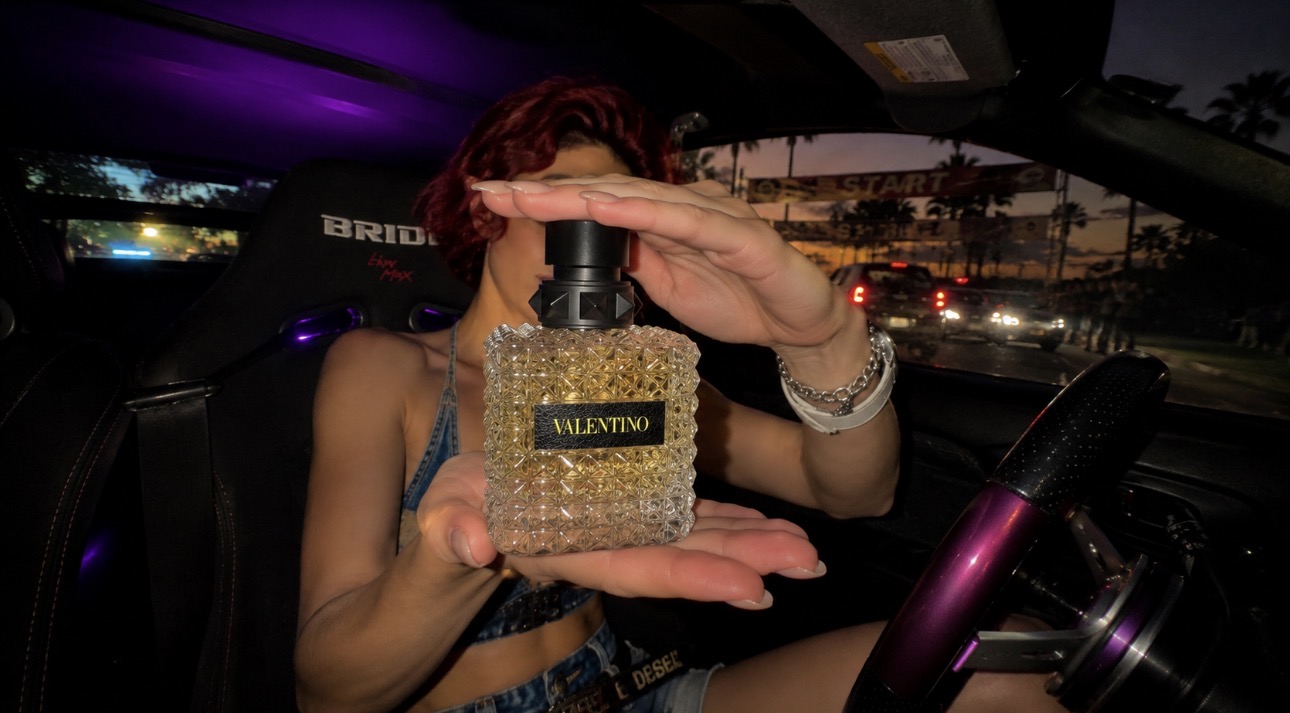 Valentino perfume product shot inside a car